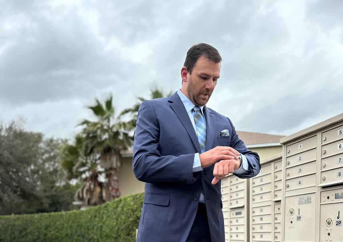 Man in blue shirt and suit